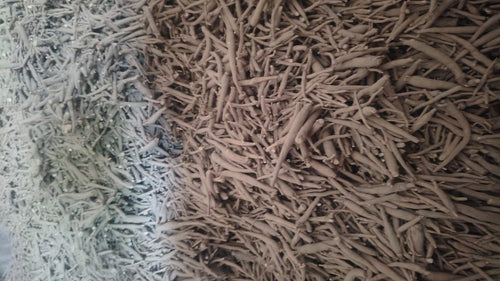 Dried Ashwagandha roots (Withania somnifera) in bulk for herbal and Ayurvedic use.
